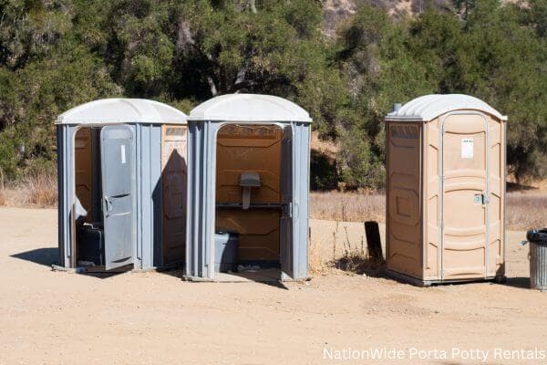 a clean row of portable restrooms for outdoor weddings or festivals in La Salle, CO